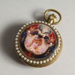 AN ENAMEL AND SEED PEARL WATCH 1.75ins diameter.