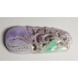 A CHINESE CARVED LILAC JADE PENDANT 3.5ins long