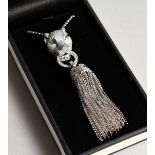 A SILVER PANTHER'S HEAD AND TASSLE NECKLACE