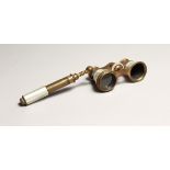 A PAIR OF IVORY, MOTHER OF PEARL AND GILT OPERA GLASSES with handle Chendlier, Paris..