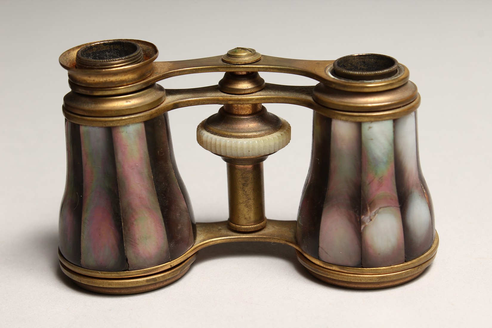 A PAIR OF MOTHER OF PEARL AND GILT OPERA GLASSES 4ins in a leather case. - Image 3 of 7