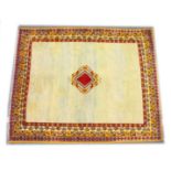 A MOROCCAN WOOL CARPET, 19TH CENTURY, cream ground with a central diamond shape design, with a