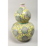 A CHINESE DOUBLE GOURD porcelain peach vase 14ins high.
