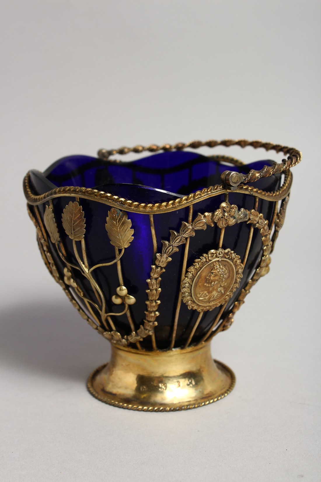 A GOOD GEORGE III SILVER GILT SUGAR BASKET with garlands and medallions and twist handle. London - Image 5 of 8
