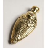 AN 18CT GOLD PLATED BIRD SCENT BOTTLE with glass eyes. 3ins long.