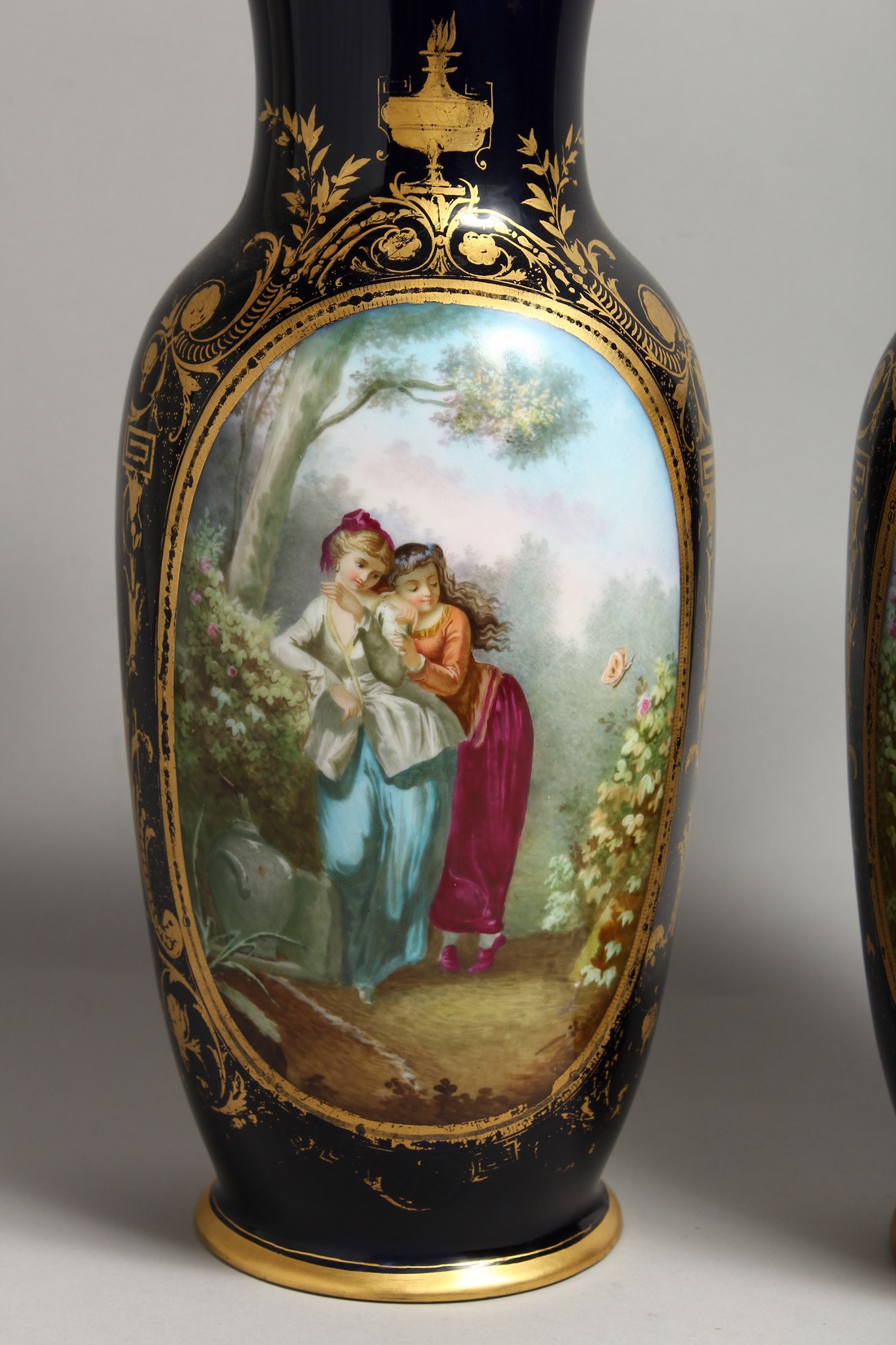 A SUPERB LARGE PAIR OF SEVRES PORCELAIN VASES rich deep blue, painted with a large panel of girls, - Image 2 of 7