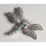 A SILVER MARCASITE AND BLUE TOPAZ DRAGONFLY BROOCH.