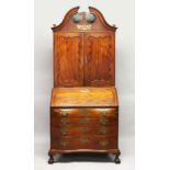 A SUPERB 18TH CENTURY AMERICAN BOSTON MAHOGANY BUREAU BOOKCASE, the top with shaped cornice over