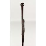 AN AFRICAN HANDLE WALKING CANE carved with an alligator