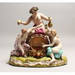 A GOOD 19TH CENTURY CONTINENTAL POTTERY GROUP depicting the grape harvest, one sitting on a