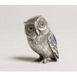 A NOVELTY CAST SILVER OWL PIN CUSHION.