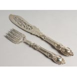 A PAIR OF VICTORIAN SILVER PIERCED AND ENGRAVED FISH SERVERS London 1854 maker, J. C.