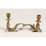 A PAIR OF AESTHETIC MOVEMENT FISH CANDLESTICKS