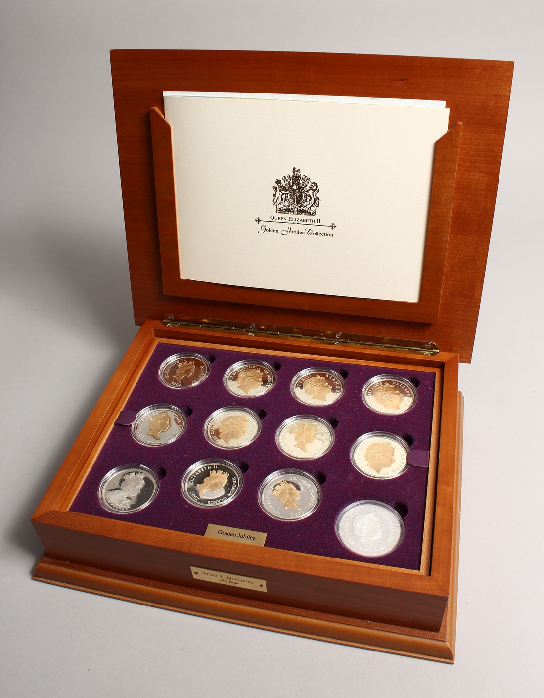 QUEEN ELIZABETH II GOLDEN JUBILEE COLLECTION, issued by the Royal Mint. Two trays of 24 carat gold