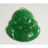 A JADE BUDDHA PENDANT with gold rings 2ins