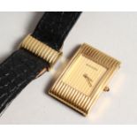 A LADIES VERY GOOD BOUCHERON 18CT GOLD WRISTWATCH with leather strap, No. A A /03136