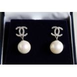 A PAIR OF 'CC' PEARL DROP EARRINGS