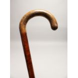 A RUSTIC WALKING CANE 3ft long