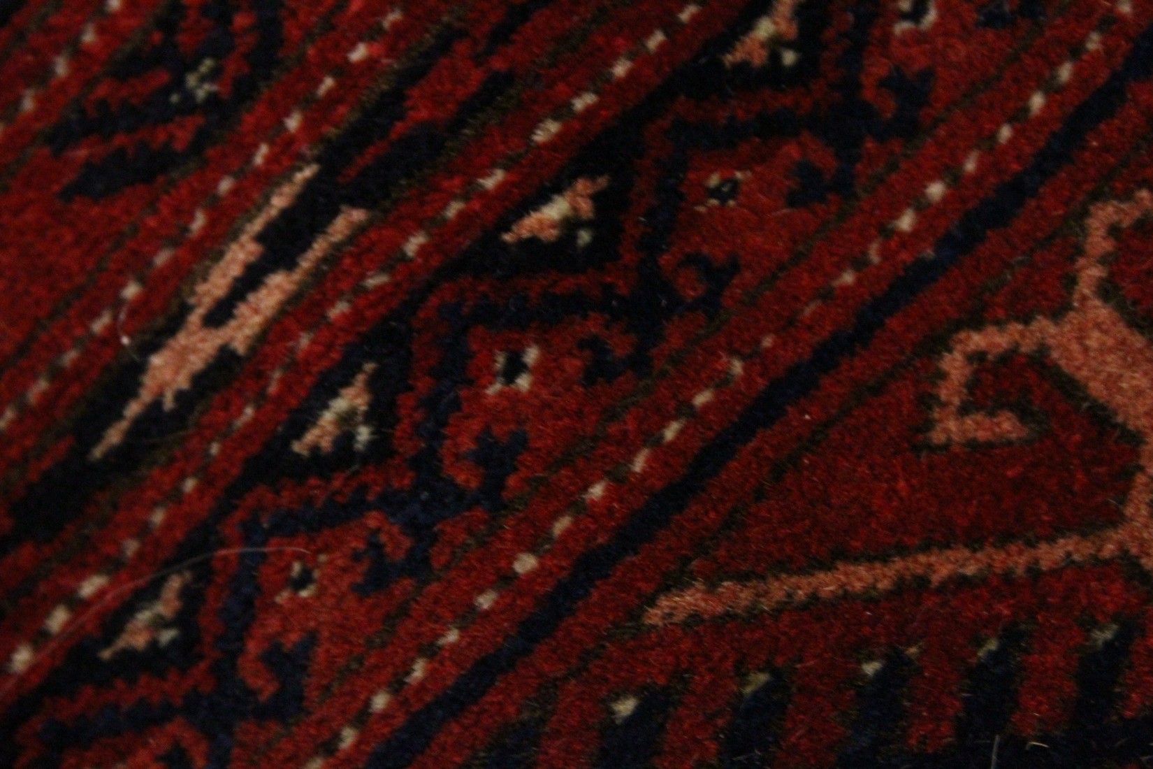 A LARGE BOKHARA CARPET, mid-20th century, red ground with seven rows of TWENTY-ONE GULLS, within a - Image 6 of 8