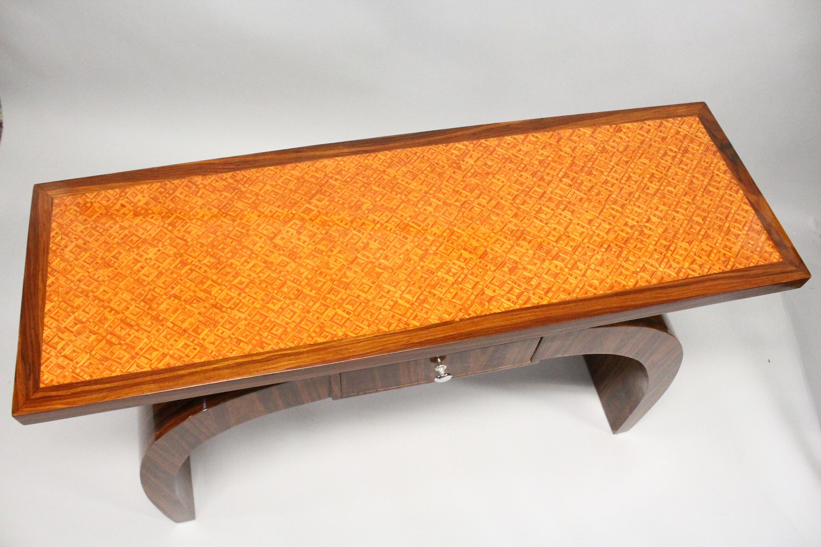 AN ART DECO STYLE ROSEWOOD CONSOLE TABLE, with a inlaid top, small drawer on curving supports 4ft - Image 2 of 2