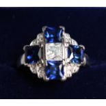 A SILVER CZ AND SAPPHIRE RING