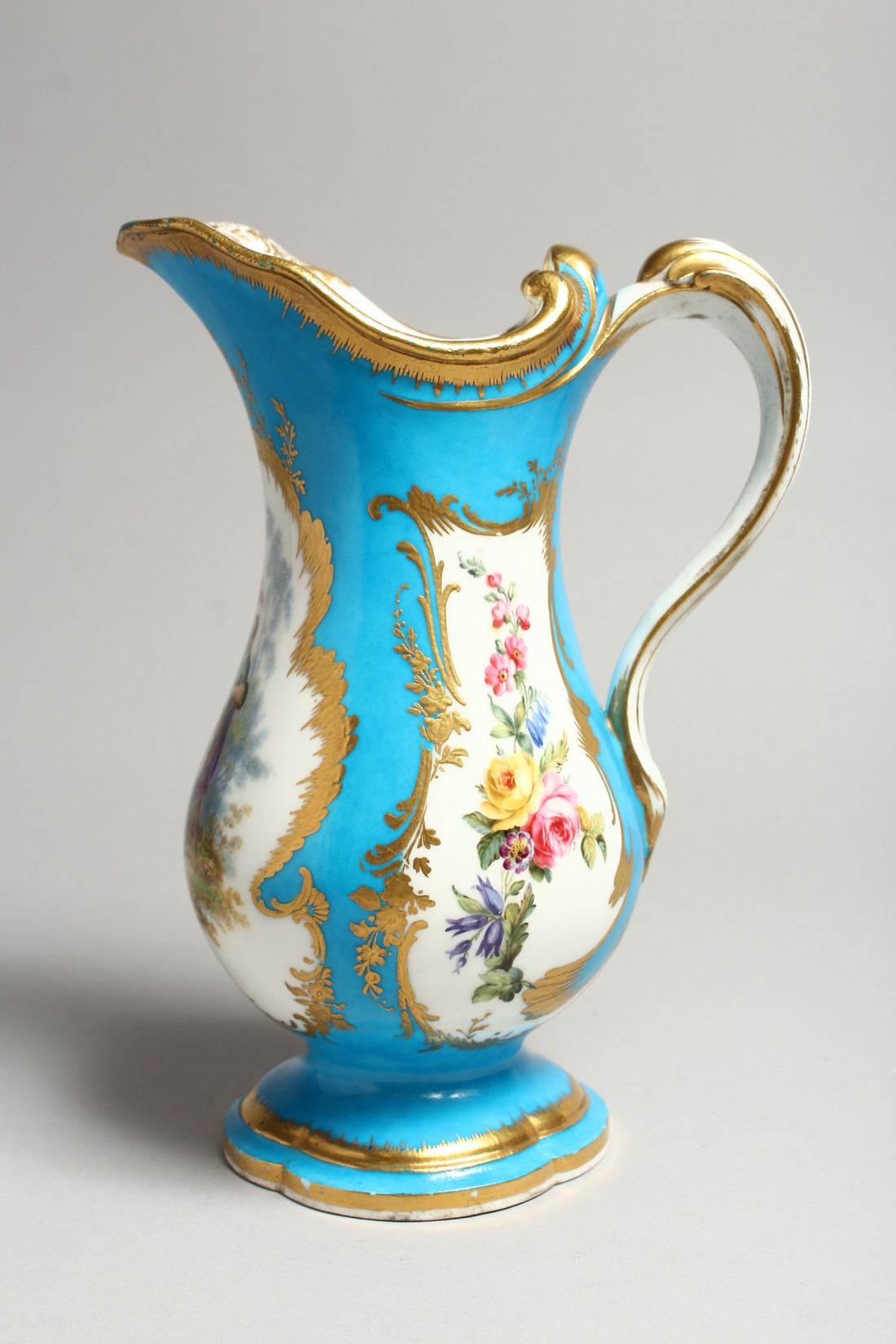 A GOOD SEVRES PORCELAIN EWER, blue ground edged in gilt and painted with three panels of figures and - Image 3 of 7