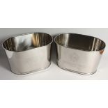 A PAIR OF PLATED OVAL WINE COOLERS 17ins long x 10ins high.