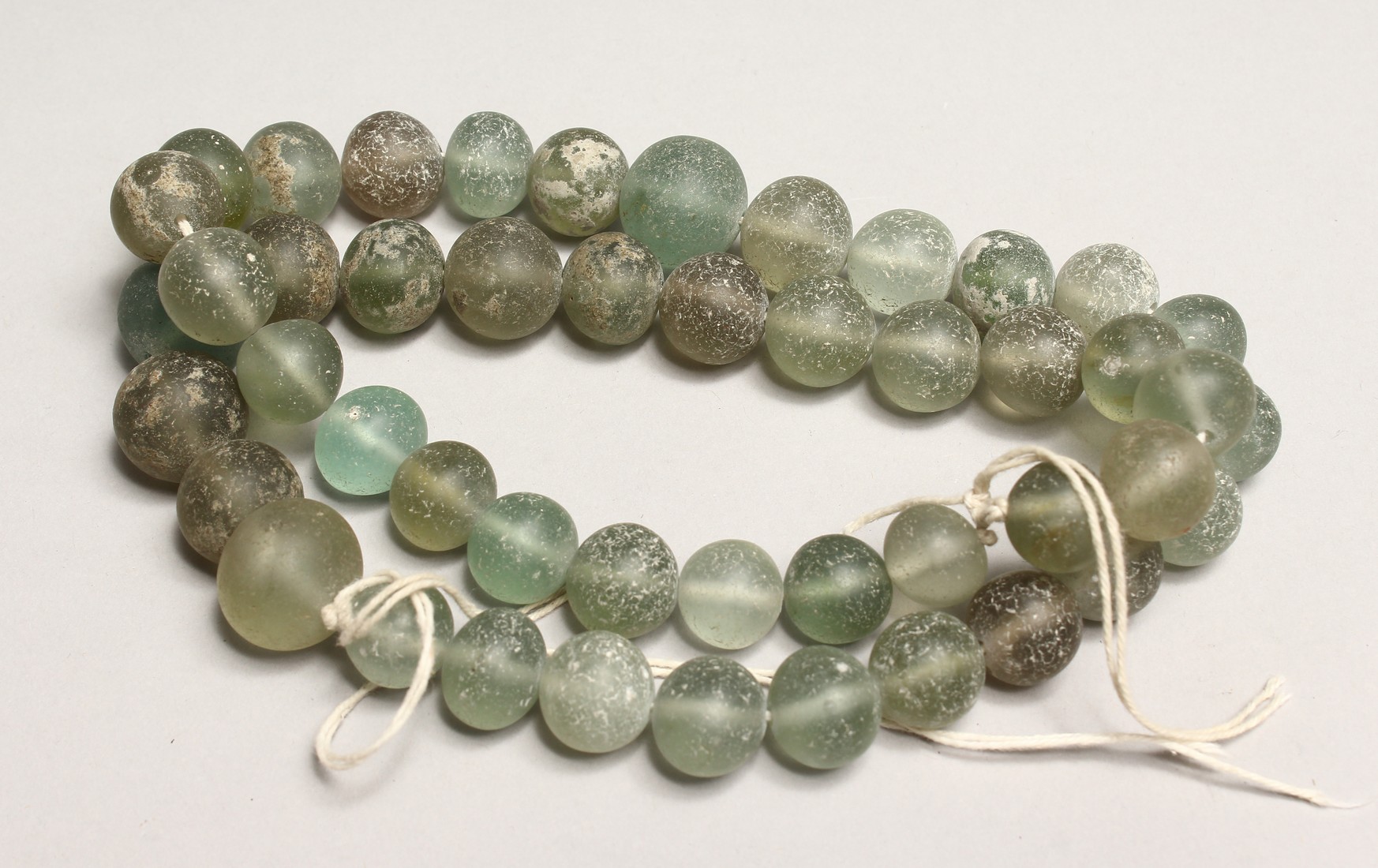 A SHIPWRECK GLASS BEAD NECKLACE