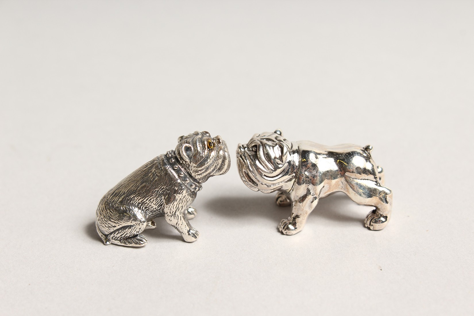 A PAIR OF NOVELTY SILVER MINI BULL DOGS - Image 2 of 3