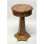 A FRENCH STYLE MARQUETRY INLAID DRUM TABLE on an hexagonal column with shaped base and ormolu