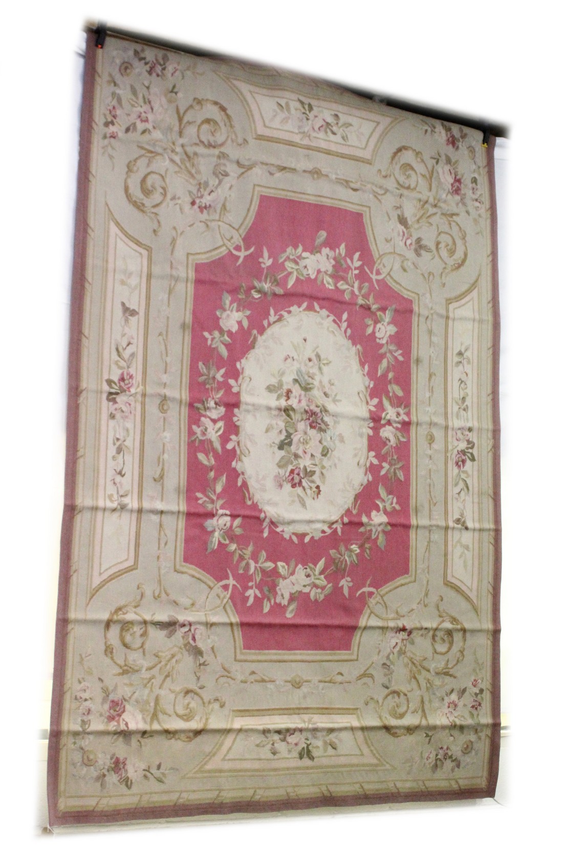 AN ABUSSON STYLE WALL HANGING/CARPET, 20TH CENTURY, pink ground within a beige ground border, with