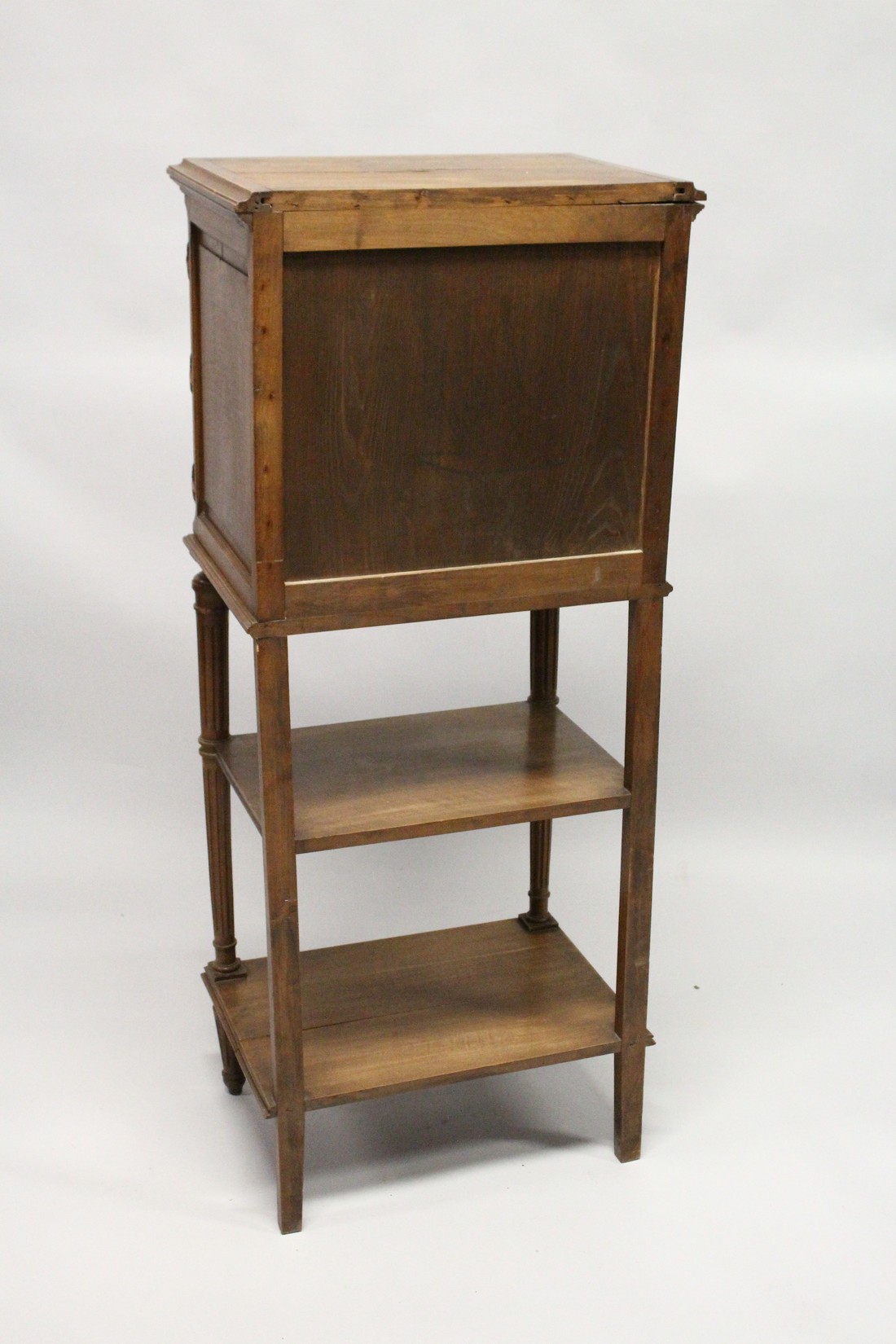 A LATE 19TH CENTURY FRENCH WALNUT MUSIC CABINET, with a pair of carved panelled doors enclosing - Image 6 of 7