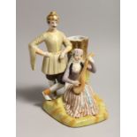 A RUSSIAN STYLE PORCELAIN SPILL VASE OF A RUSSIAN MAN, the woman playing a guitar.