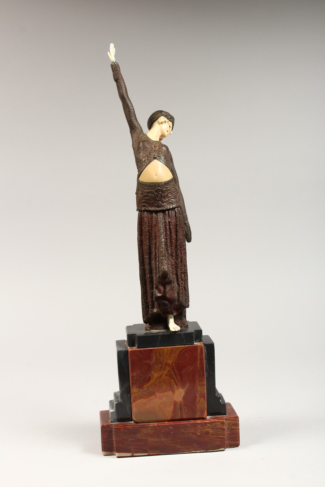 AN ART DECO STYLE FIGURE OF A LADY, arm outstretched, on a stepped marble base 16ins high. - Image 3 of 5