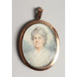 AN OVAL MINIATURE OF A LADY