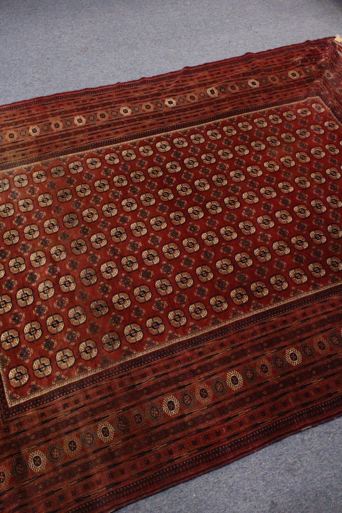 A LARGE BOKHARA CARPET, mid-20th century, red ground with seven rows of TWENTY-ONE GULLS, within a - Image 3 of 8