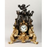 A LARGE FRENCH STYLE BRONZE AND GILT BRONZE MANTLE CLOCK, with eight day movement sticking a bell,
