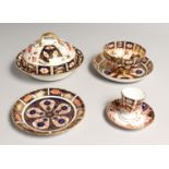 SEVEN VARIOUS CROWN DERBY JAPAN PATTERN EGG CUPS AND STANDS, BOWL AND TWO SAUCERS, muffin dish and