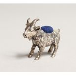 A NOVELTY CAST SILVER RAM PIN CUSHION