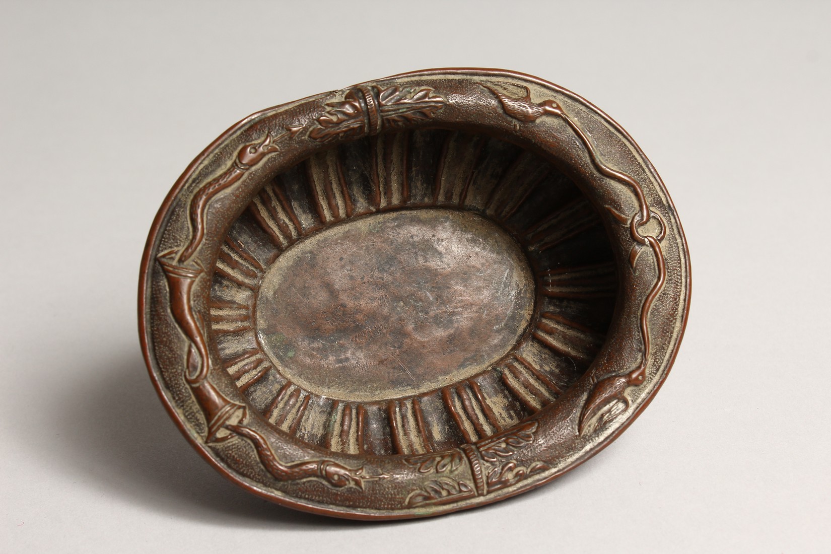 A N 18TH CENTURY DUTCH COPPER OVAL BOWL on four claw feet 5.25ins - Image 6 of 7