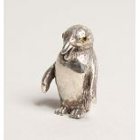 A NOVELTY CAST SLVER PENGUIN PIN CUSHION