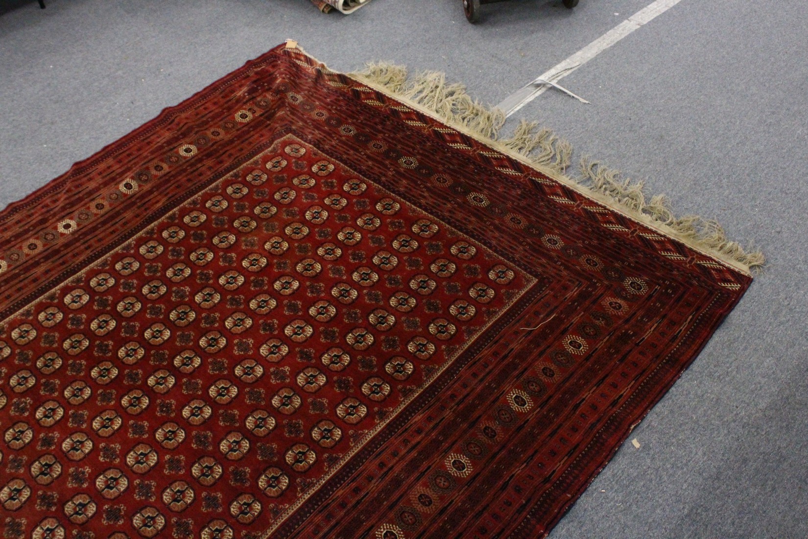 A LARGE BOKHARA CARPET, mid-20th century, red ground with seven rows of TWENTY-ONE GULLS, within a - Image 4 of 8