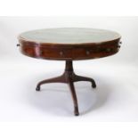A 19TH CENTURY MAHOGANY AND LEATHER INSET DRUM TABLE with four real and four fake drawers to the