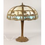 A VERY GOOD 1920'S AMERICAN INFLUENCED TIFFANY TYPE BRONZE AND MOTHER OF PEARL TABLE LAMP AND SHADE.