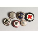 SIX "NAZI" BADGES.