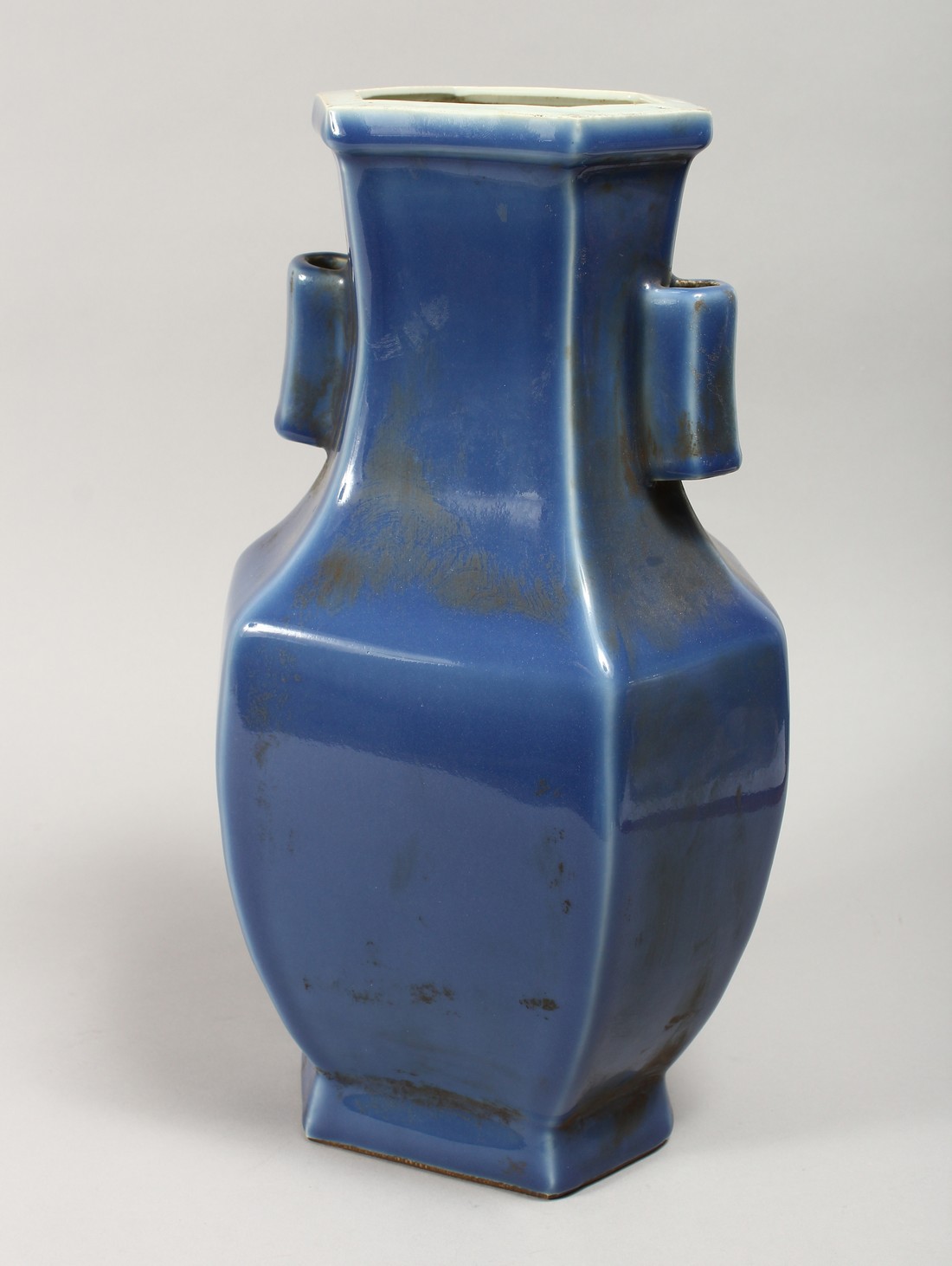 A CHINESE BLUE GROUND PORCELAIN "ARROW" VASE, of flattened hexagonal form with twin handles 14.