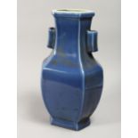 A CHINESE BLUE GROUND PORCELAIN "ARROW" VASE, of flattened hexagonal form with twin handles 14.