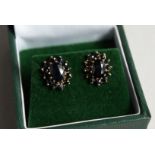 A PAIR OF 9CT GOLD CLUSTER SAPPHIRE EARRINGS