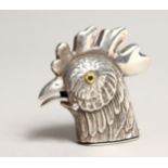 A NOVELTY CAST SILVER COCKEREL VESTA PIN CUSHION.