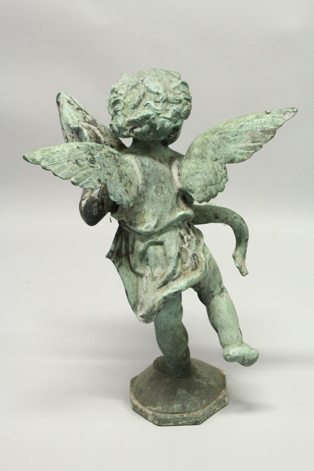 AN 18TH CENTURY LEAD FOUNTAIN as a winged cupid holding a fish, on an octagonal base. 2ft 5ins - Image 3 of 3